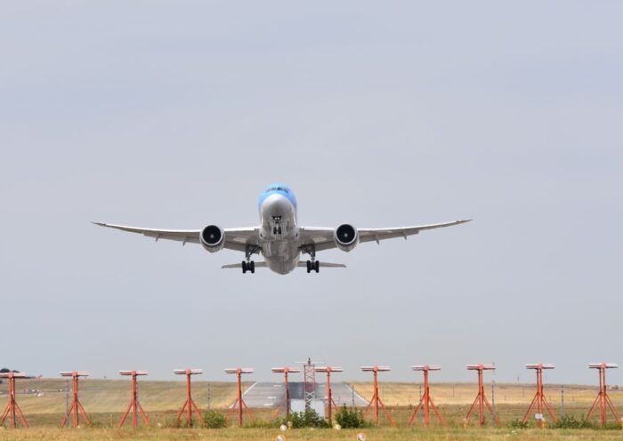 Wide-body airplane taking off from a runway